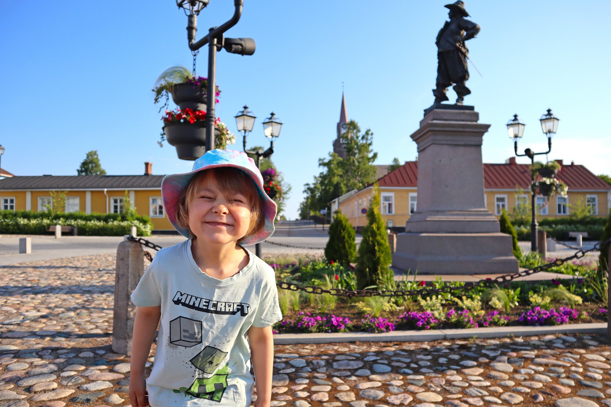 boy on Pekkatori square in old town raahe
