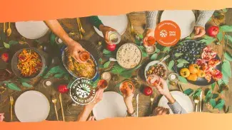 Food on the table, tablecloth, people's hands taking food